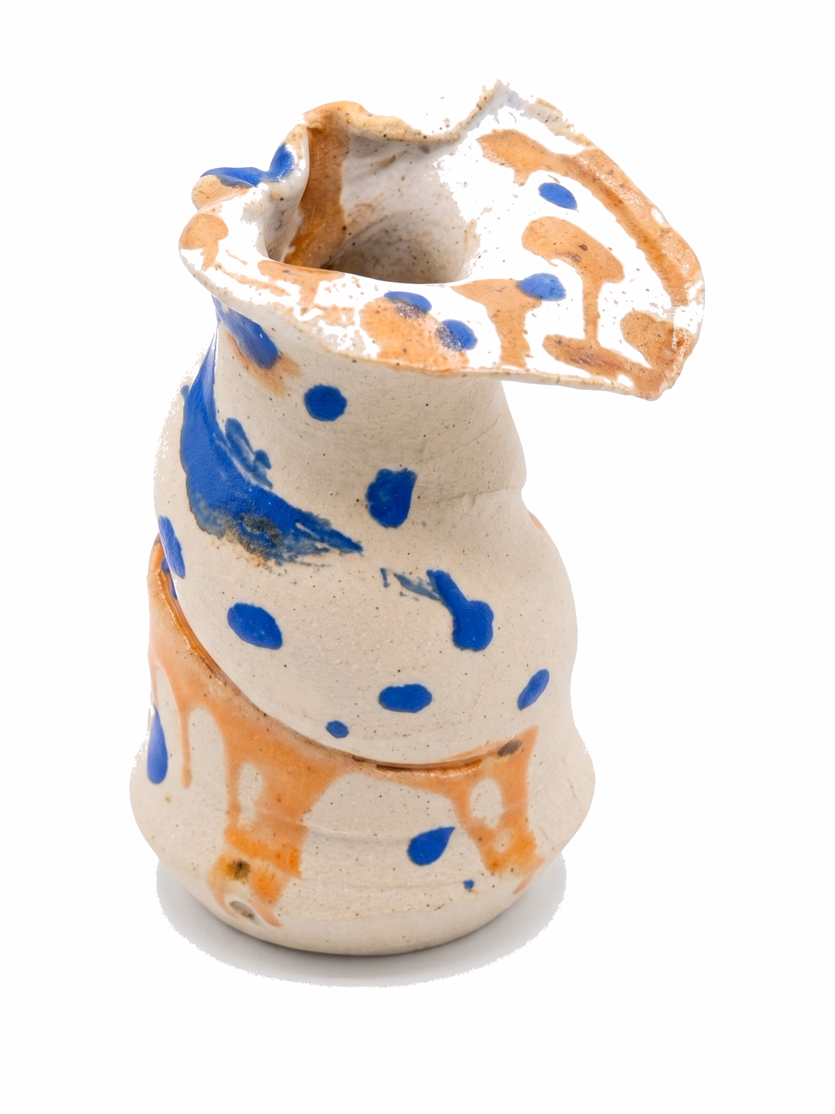 A pinched and folded bottle in raw cream stoneware, scattered with cobalt blue dots and an iron-orange band running diagonally.