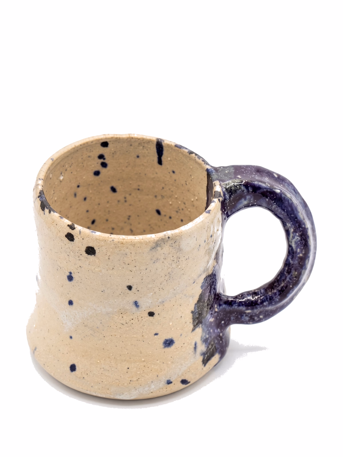 A cream stoneware mug speckled with navy, with a deep purple looped handle.